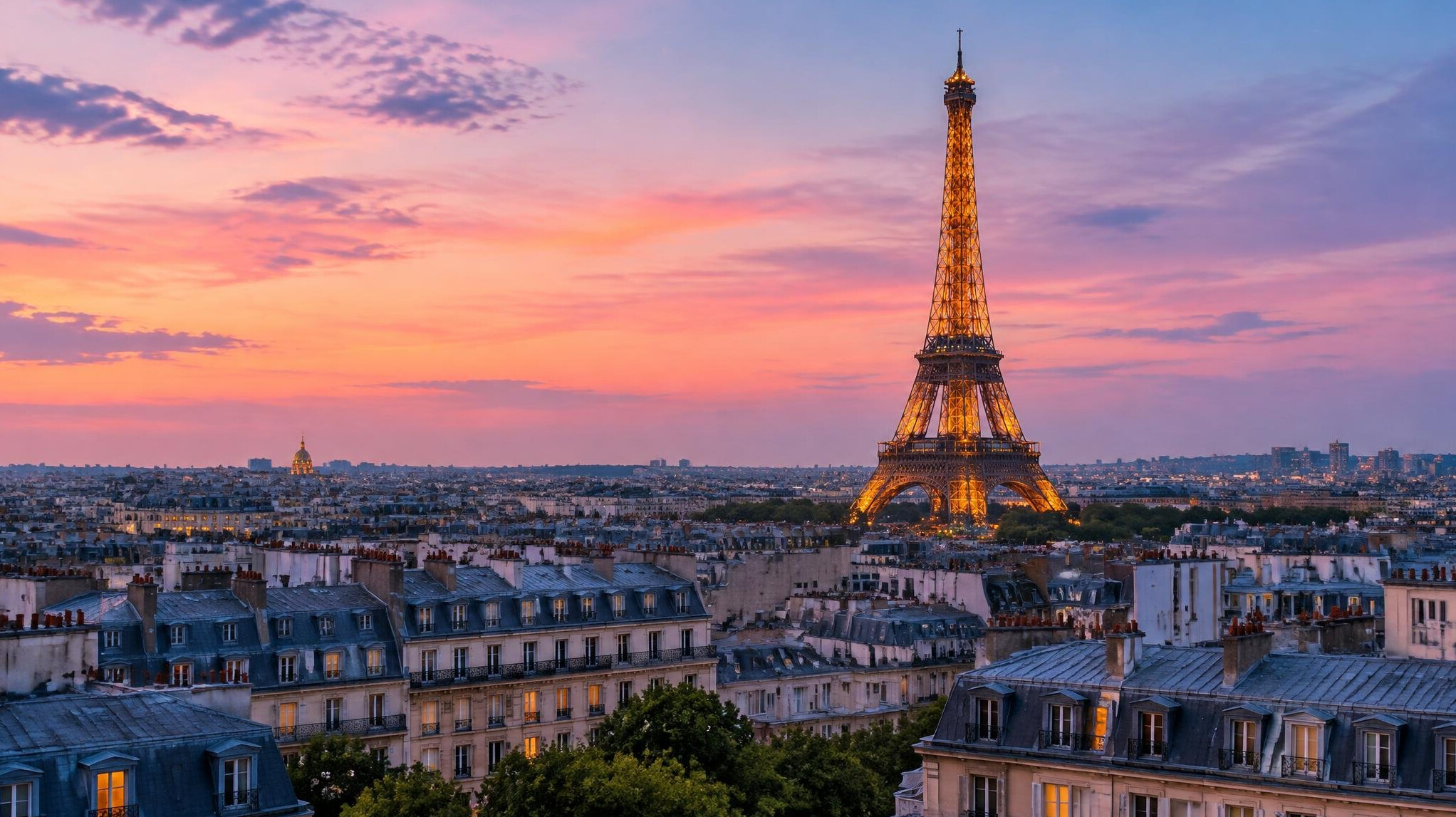 Eiffel Tower and Paris rooftops at dusk